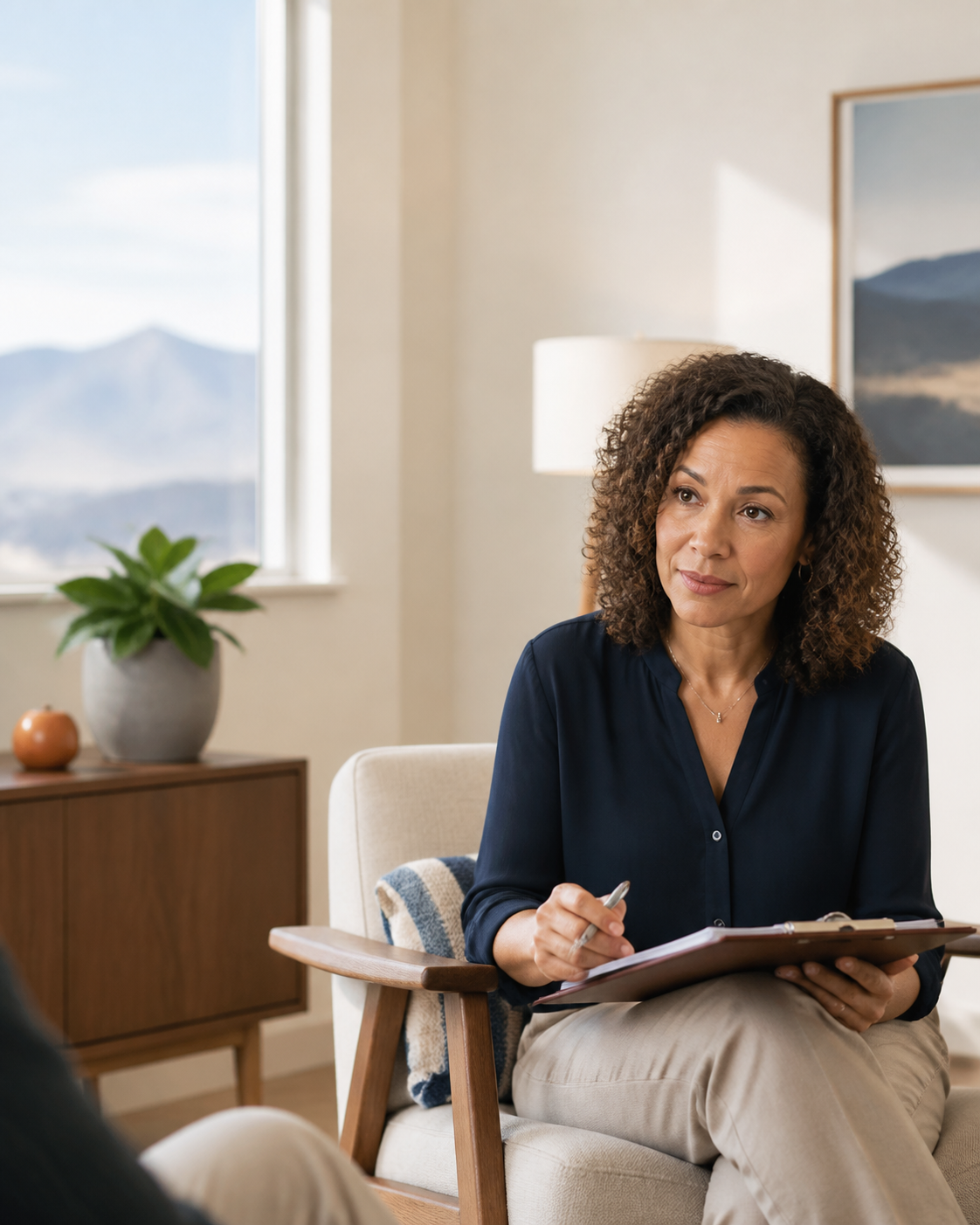 Clinician reviewing a personalized care plan in a bright Denver treatment setting